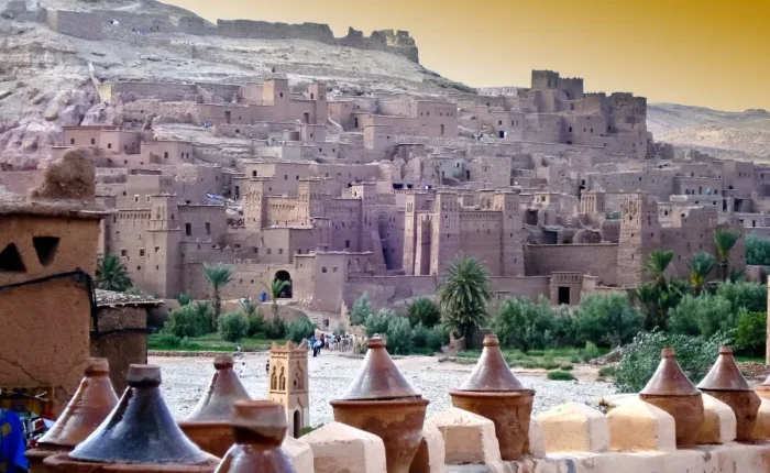 A panoramic view of Morocco's cityscape from a hilltop, showcasing the vibrant architecture and landscape.