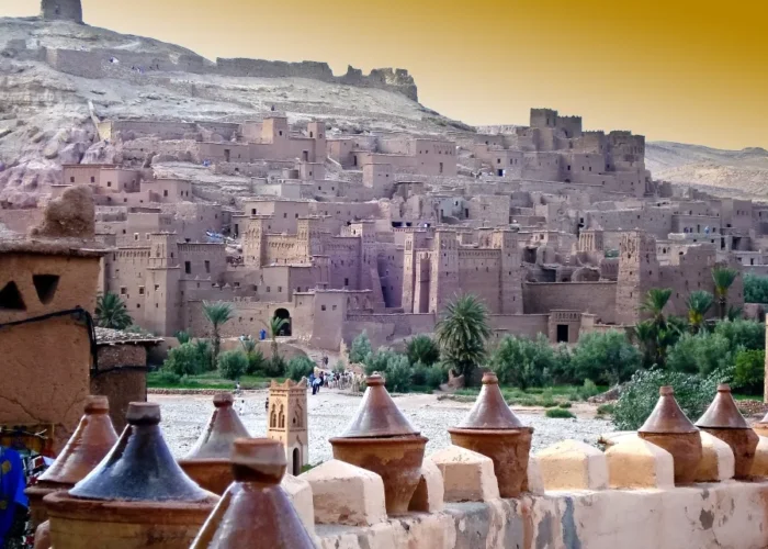 A panoramic view of Morocco's cityscape from a hilltop, showcasing the vibrant architecture and landscape.