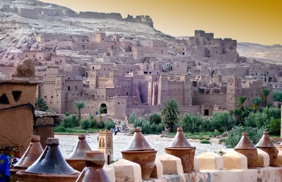 A panoramic view of Morocco's cityscape from a hilltop, showcasing the vibrant architecture and landscape.