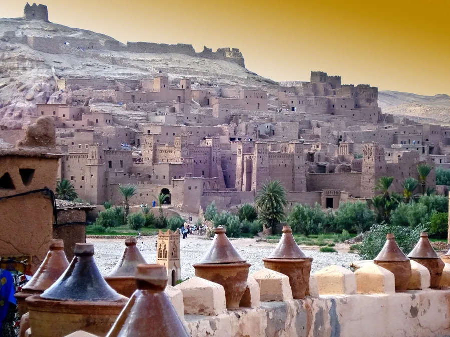 A panoramic view of Morocco's cityscape from a hilltop, showcasing the vibrant architecture and landscape.