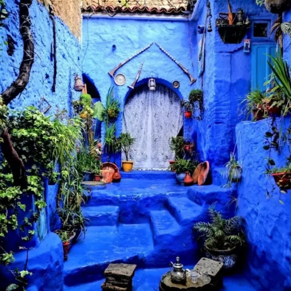 Scenic view of Chefchaouen, Morocco, showcasing its iconic blue buildings, part of a Morocco trip package.