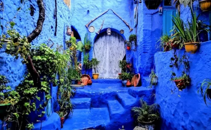 Scenic view of Chefchaouen, Morocco, showcasing its iconic blue buildings, part of a Morocco trip package.