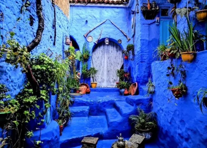 Scenic view of Chefchaouen, Morocco, showcasing its iconic blue buildings, part of a Morocco trip package.