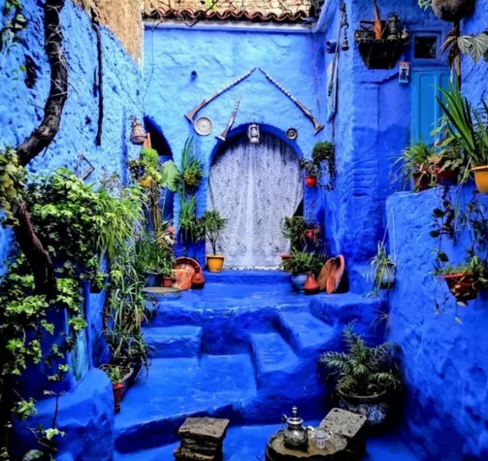 Scenic view of Chefchaouen, Morocco, showcasing its iconic blue buildings, part of a Morocco trip package.