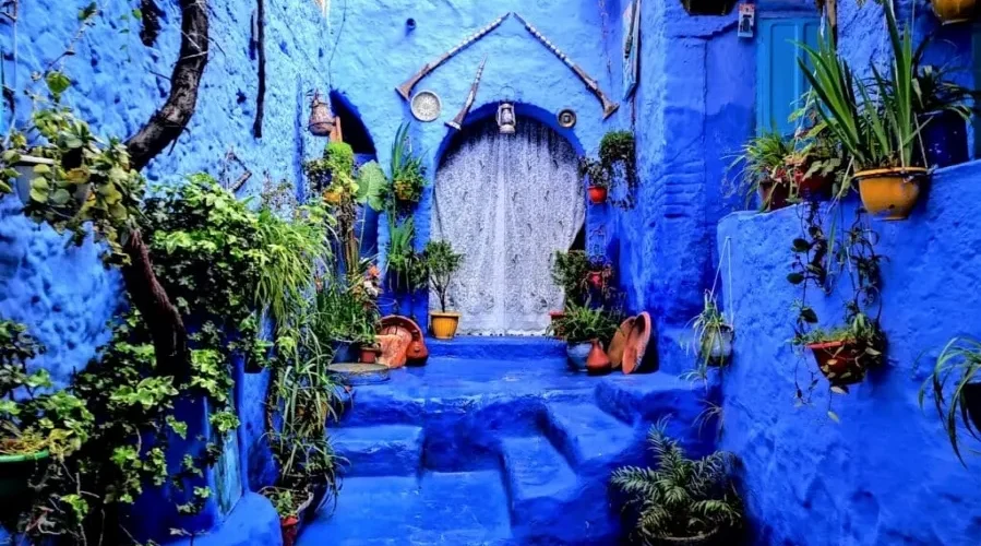 Scenic view of Chefchaouen, Morocco, showcasing its iconic blue buildings, part of a Morocco trip package.