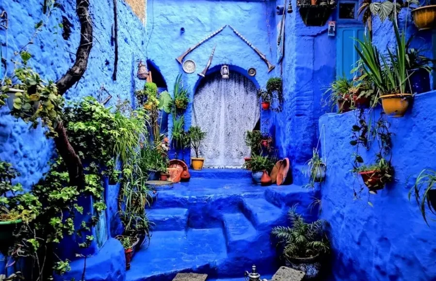Scenic view of Chefchaouen, Morocco, showcasing its iconic blue buildings, part of a Morocco trip package.