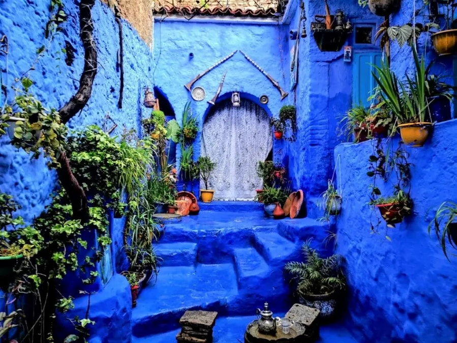 Scenic view of Chefchaouen, Morocco, showcasing its iconic blue buildings, part of a Morocco trip package.