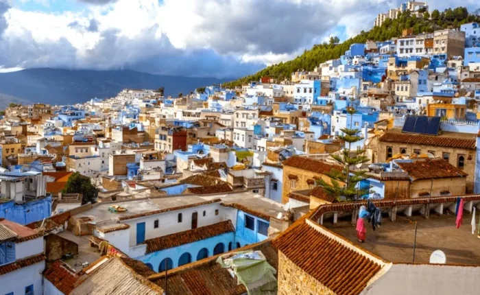 Scenic view of Chefchaouen, Morocco, showcasing its iconic blue buildings, ideal for travelers exploring Morocco trip packages.