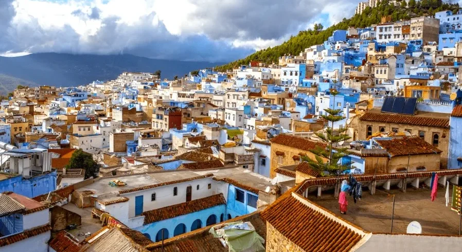 Scenic view of Chefchaouen, Morocco, showcasing its iconic blue buildings, ideal for travelers exploring Morocco trip packages.