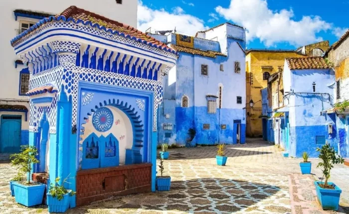 Scenic view of Chefchaouen, Morocco, known for its blue buildings, ideal for visiting in spring or fall.