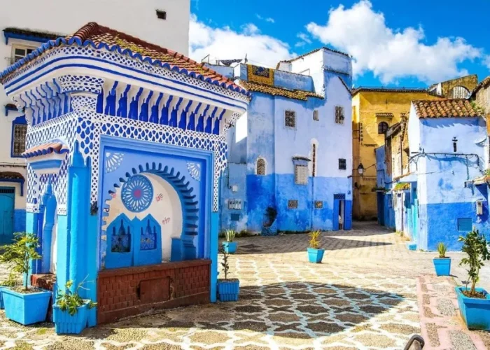 Scenic view of Chefchaouen, Morocco, known for its blue buildings, ideal for visiting in spring or fall.