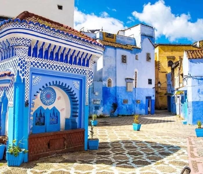 Scenic view of Chefchaouen, Morocco, known for its blue buildings, ideal for visiting in spring or fall.