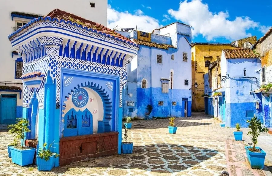 Scenic view of Chefchaouen, Morocco, known for its blue buildings, ideal for visiting in spring or fall.