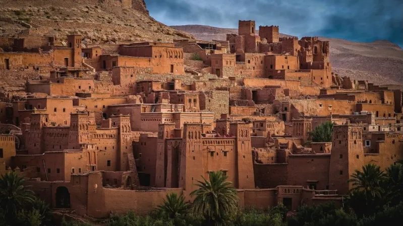 A panoramic view of a Moroccan city, showcasing its architecture and vibrant culture, promoted by a Morocco tours agency.