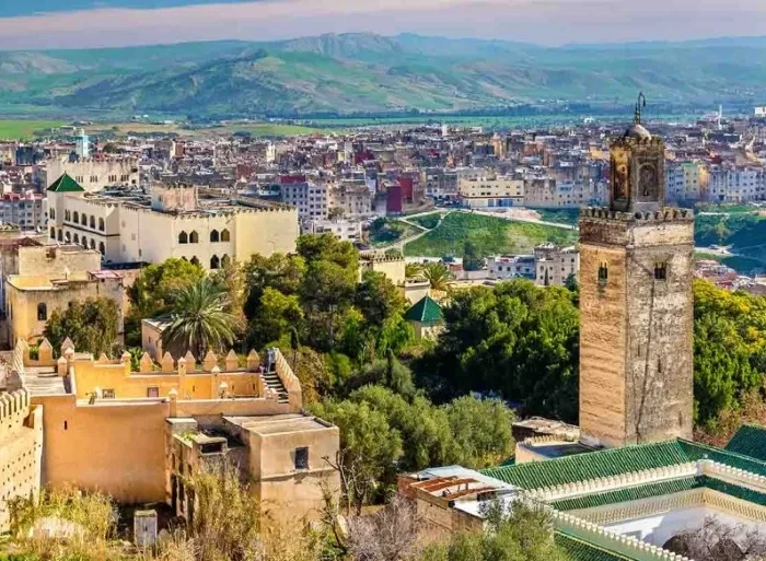 A panoramic view of Marrakech, showcasing its vibrant architecture and bustling streets, part of Morocco's essential cities.