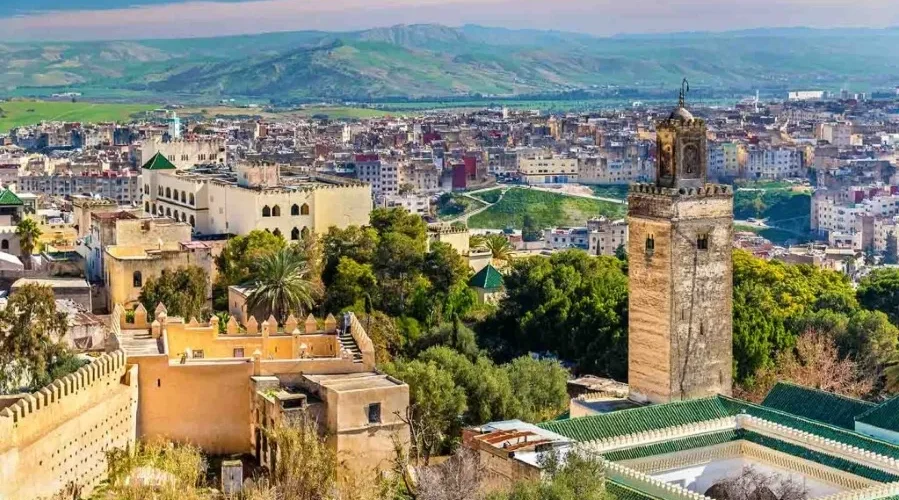 A panoramic view of Marrakech, showcasing its vibrant architecture and bustling streets, part of Morocco's essential cities.