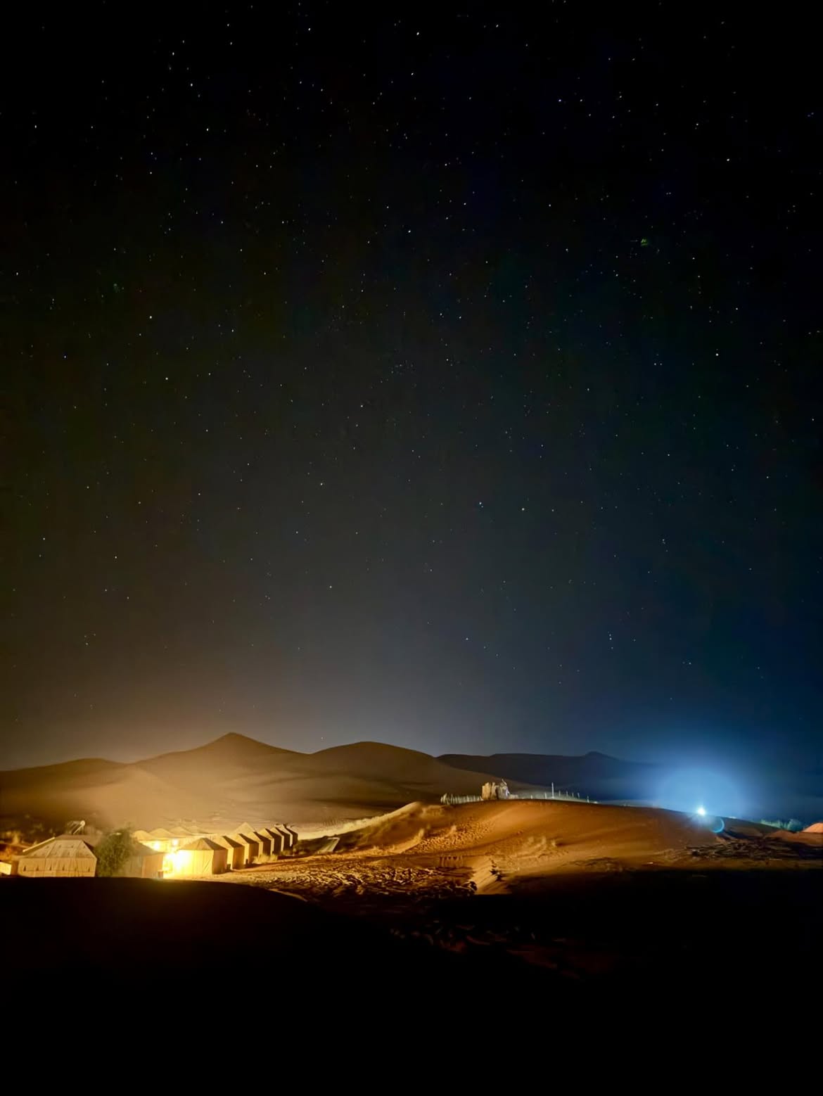 Stargazing over the dunes at night during a Morocco luxury desert experience