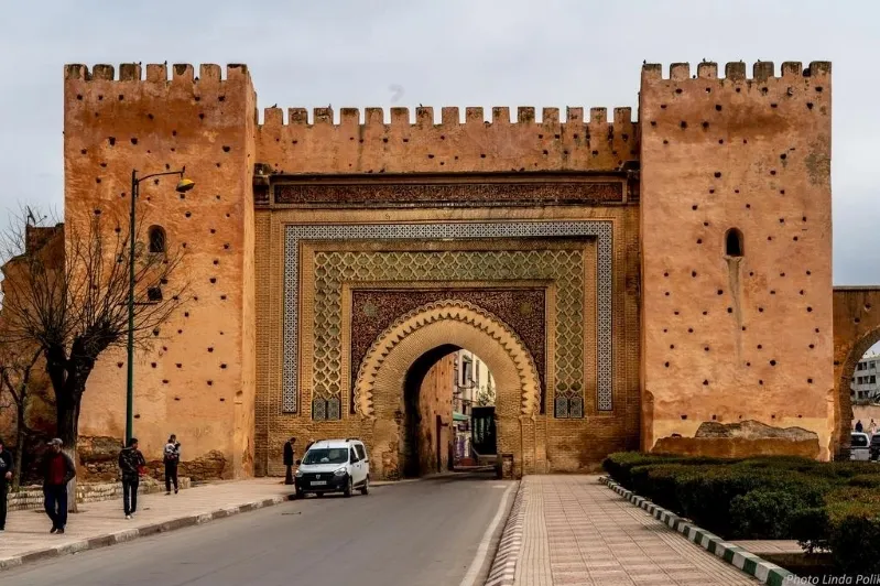 Entrance to Marrakech, showcasing vibrant architecture, a gateway to a premium Morocco tour experience.