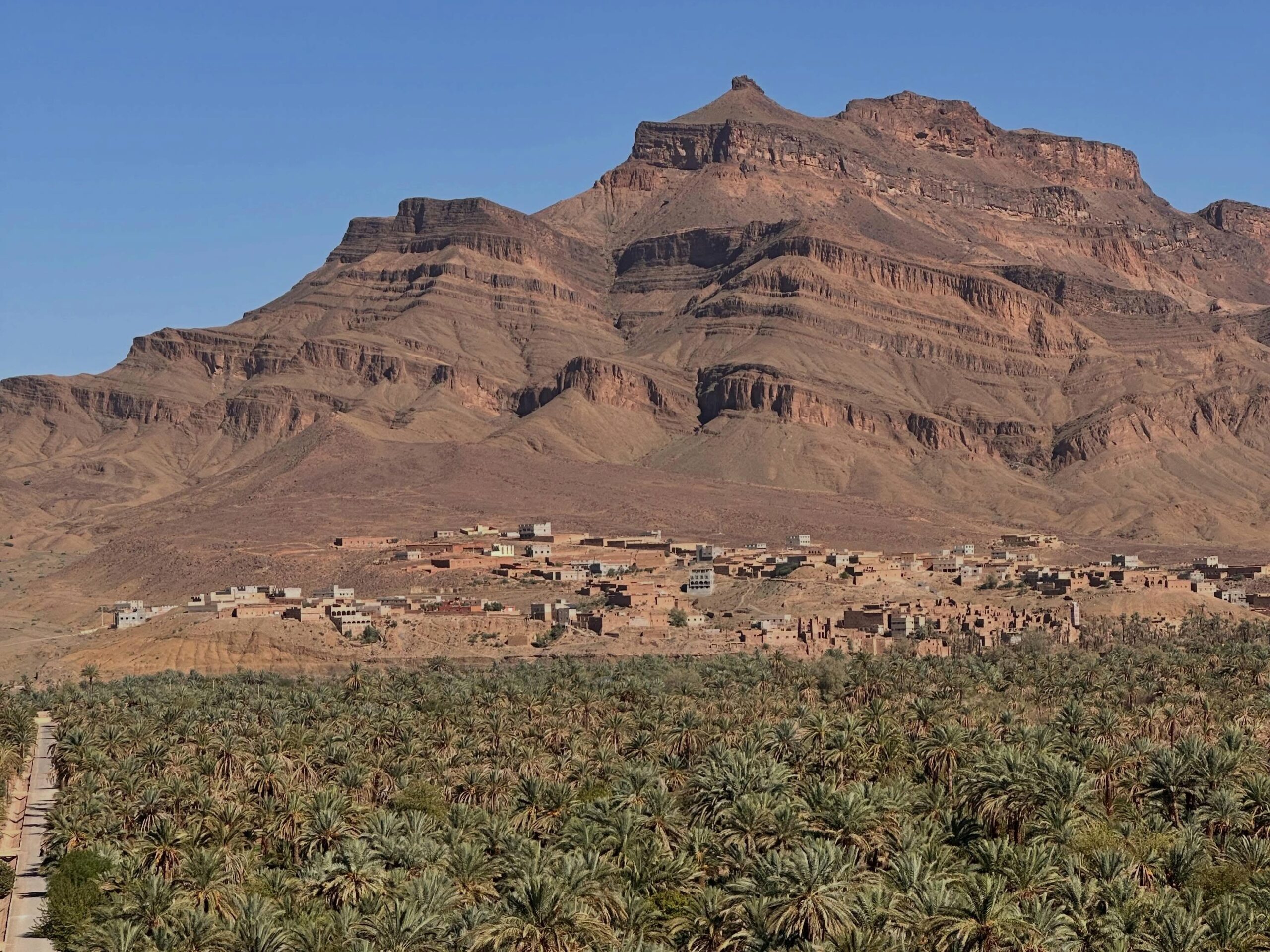 Palm groves and mud brick villages in the heart of the Draa Valley