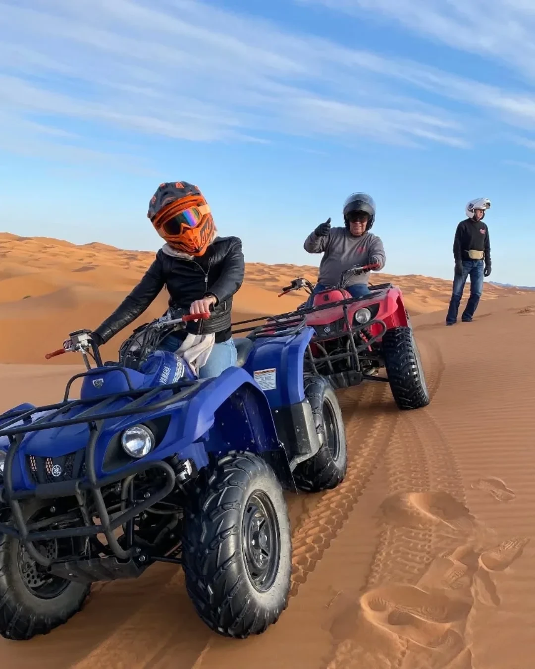 Quad biking safety gear including helmet, goggles and gloves before a Merzouga ATV adventure