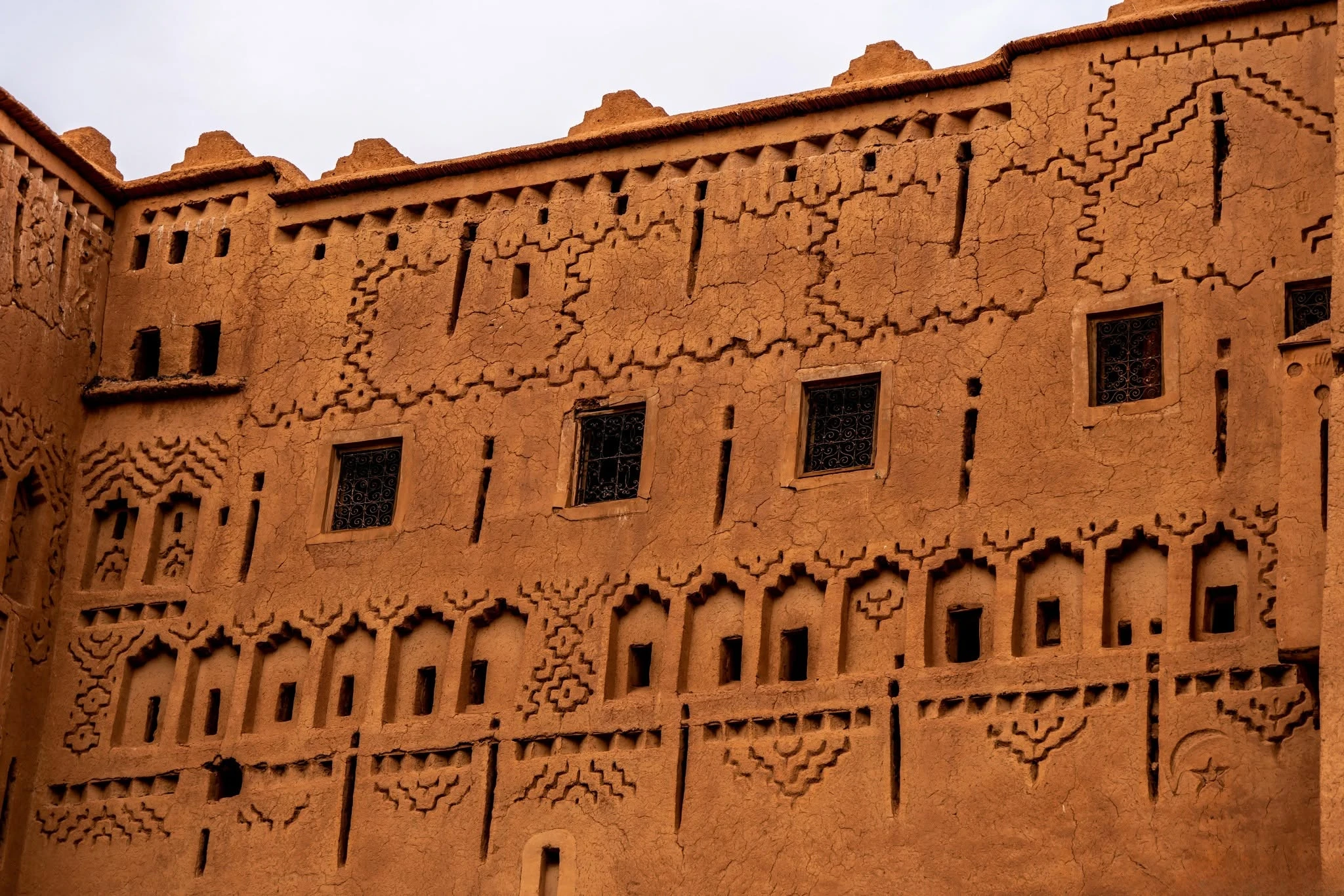 Earthen architecture of Taourirt Kasbah showing layers of rammed earth construction