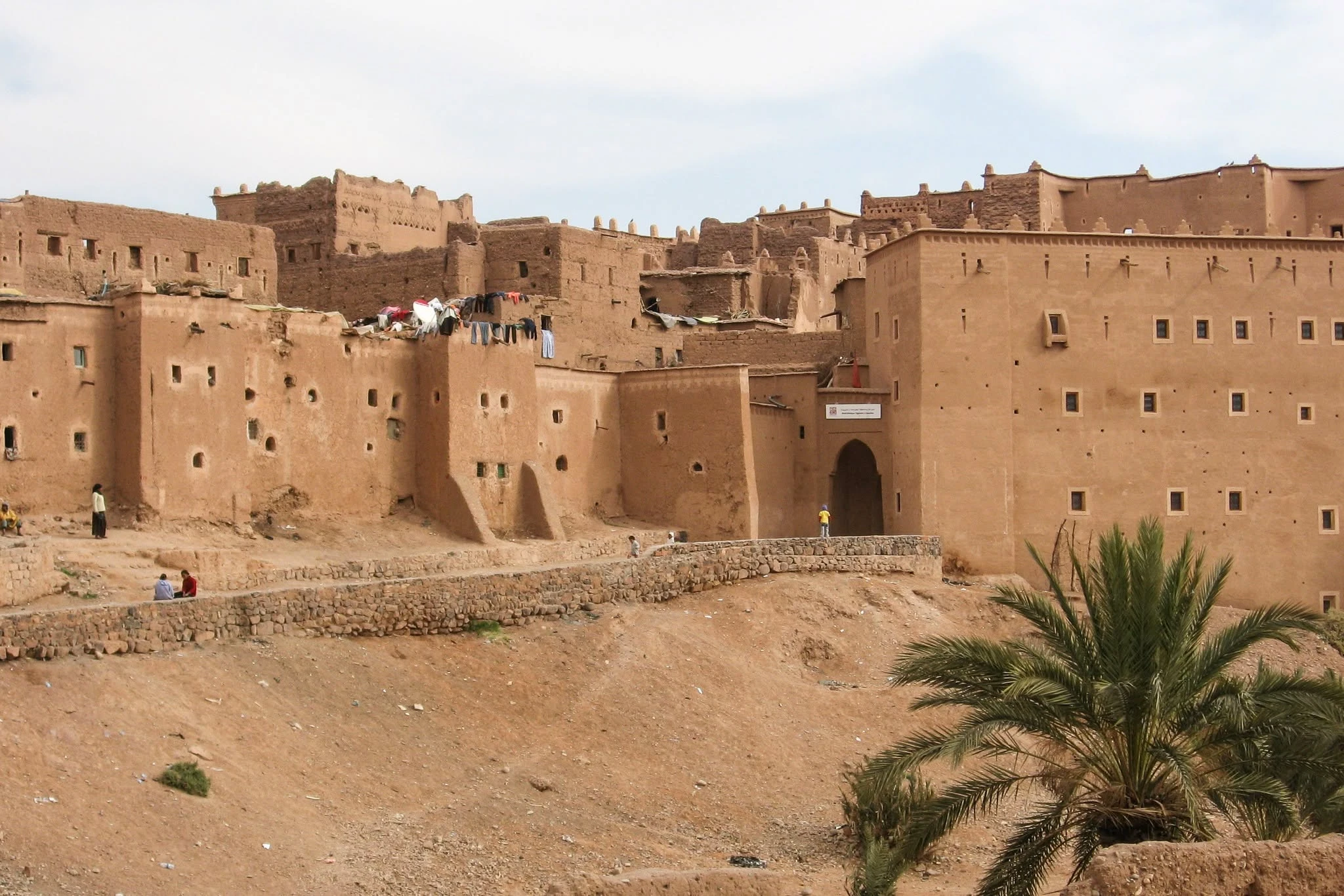 Exterior walls of Taourirt Kasbah in Ouarzazate showing the height of the earthen fortifications