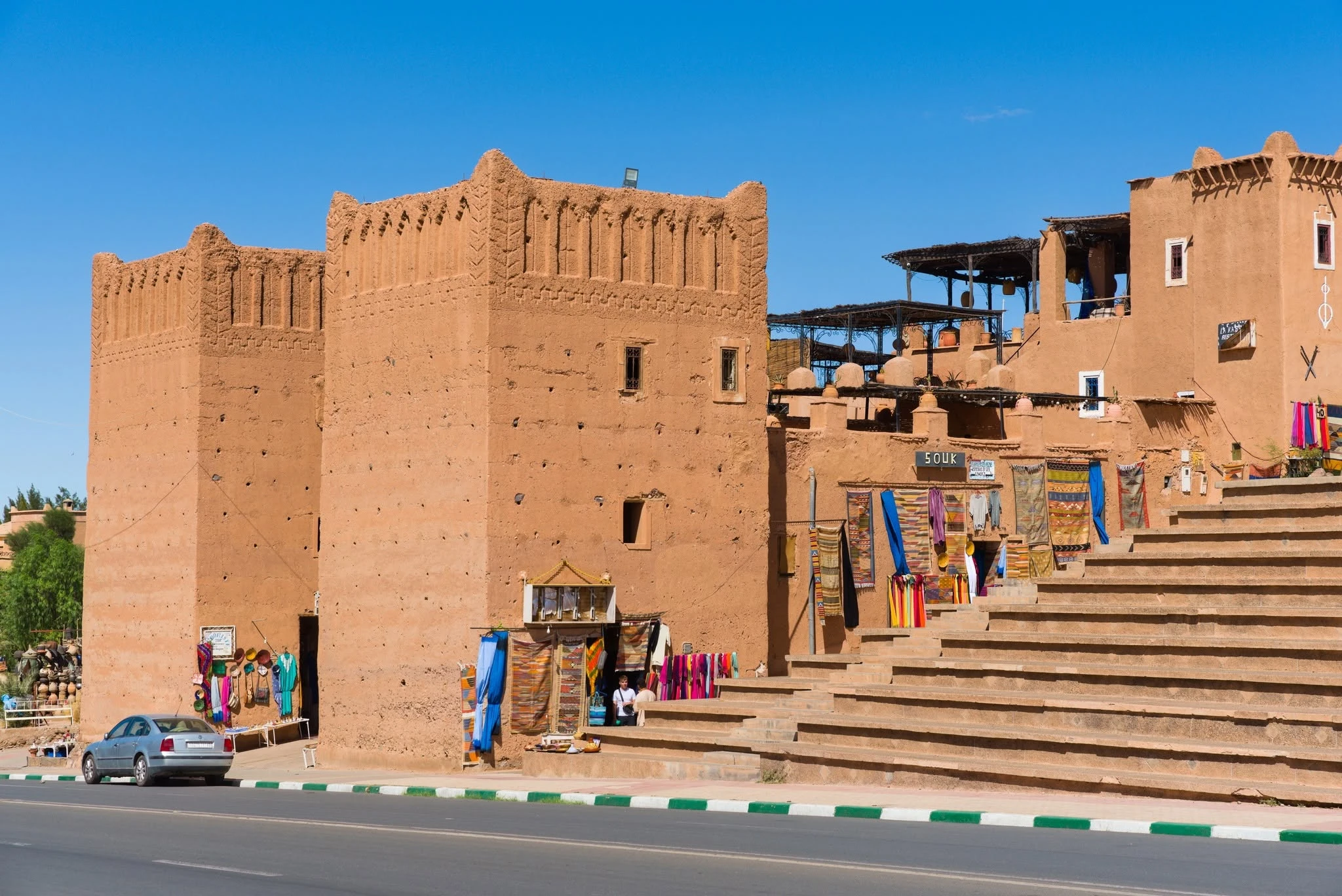 Panoramic view of Taourirt Kasbah in Ouarzazate, Morocco, with its earthen towers and terraces
